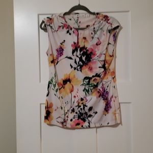 Floral print sleeveless blouse